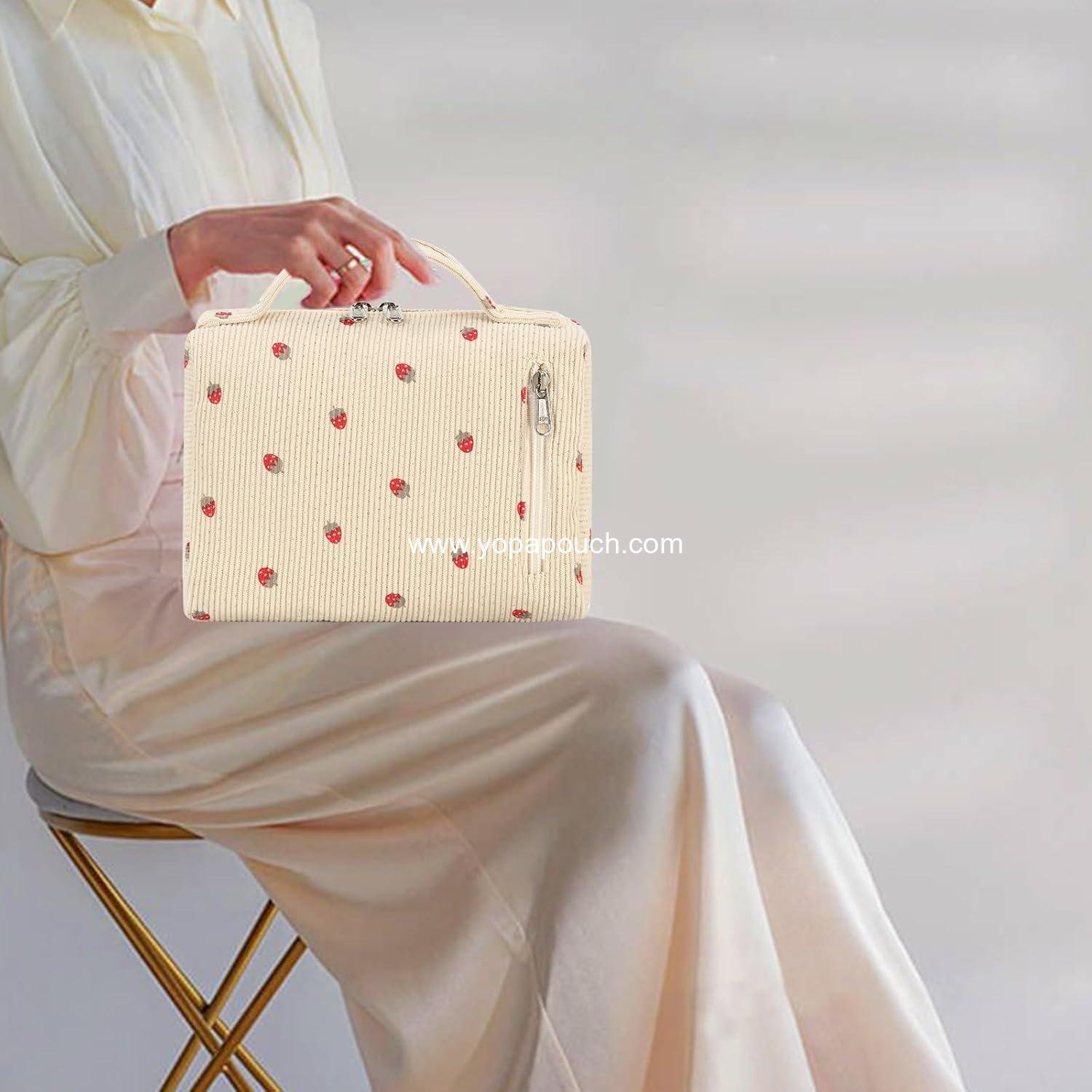 Wholesale Portable Cosmetic Bag Organizer for Women and Girls - Zipper Pouch Travel Toiletry Bag in Strawberry Corduroy Beige - Supplier