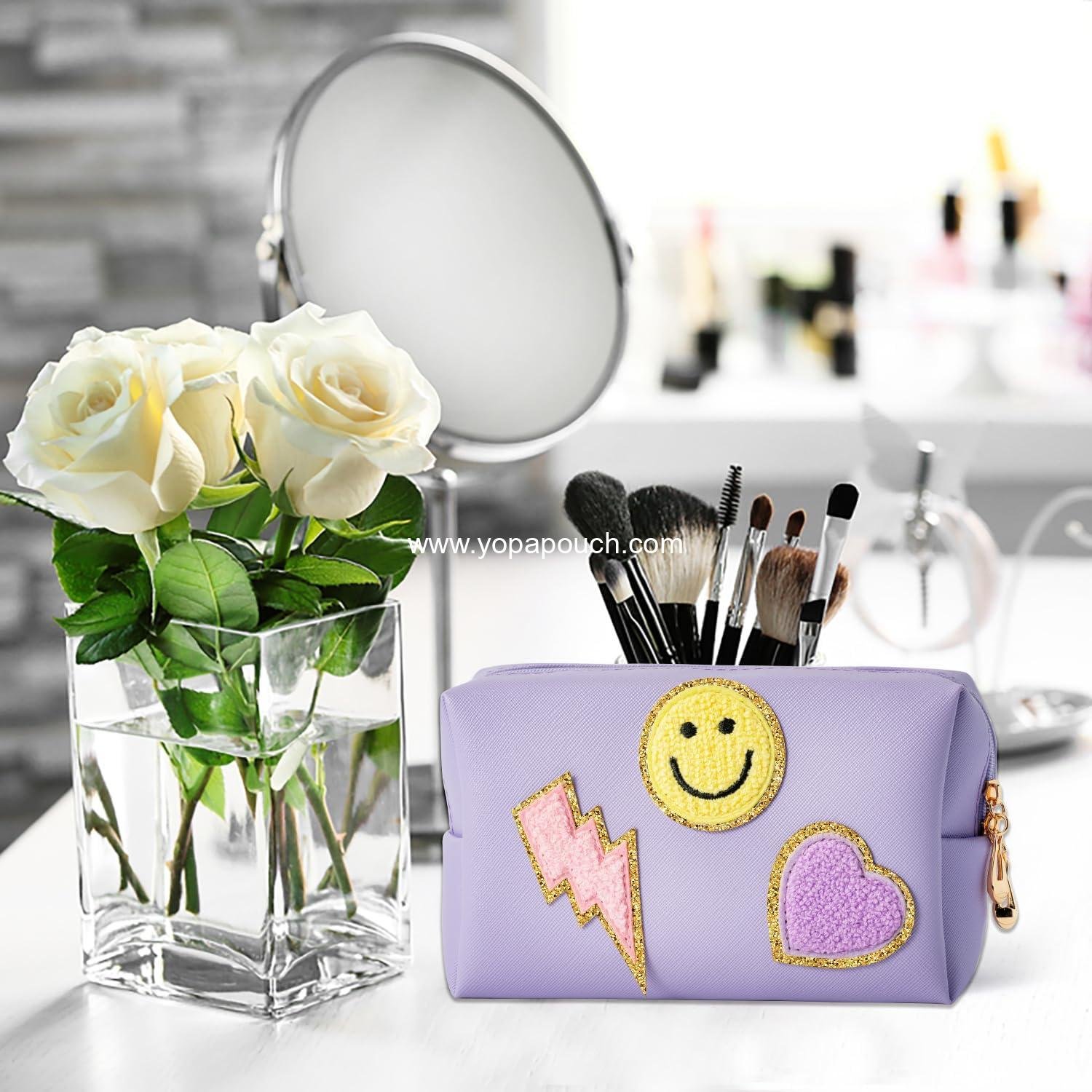 Wholesale Portable Waterproof Makeup Bag, Small Toiletry Organizer with Smile Lightning Heart Design, Daily Use Storage Purse for Women and Girls (Taro Purple) Supplier